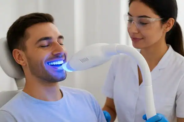 Man receiving Blue Light Teeth Whitening Andover Andover